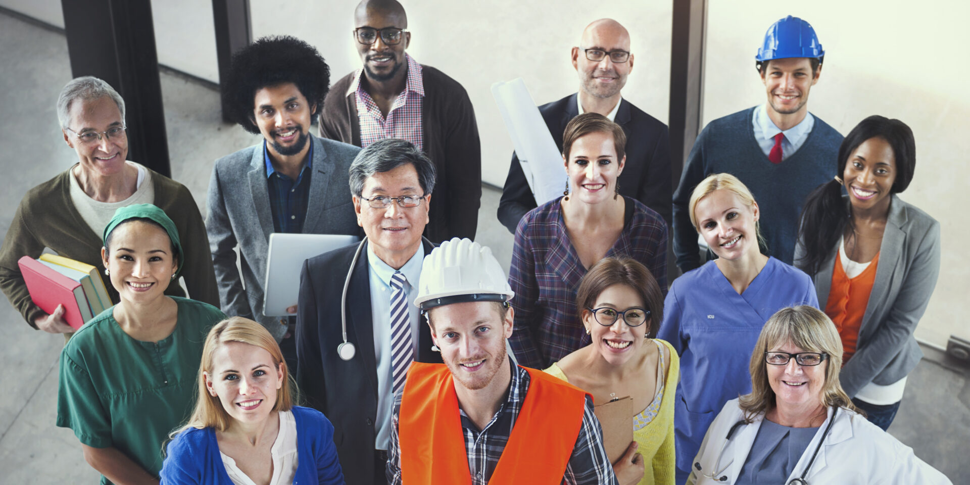 A group of people that are standing up together.